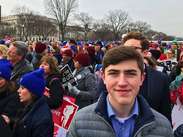 Nick Sandmann outside in the streets protesting