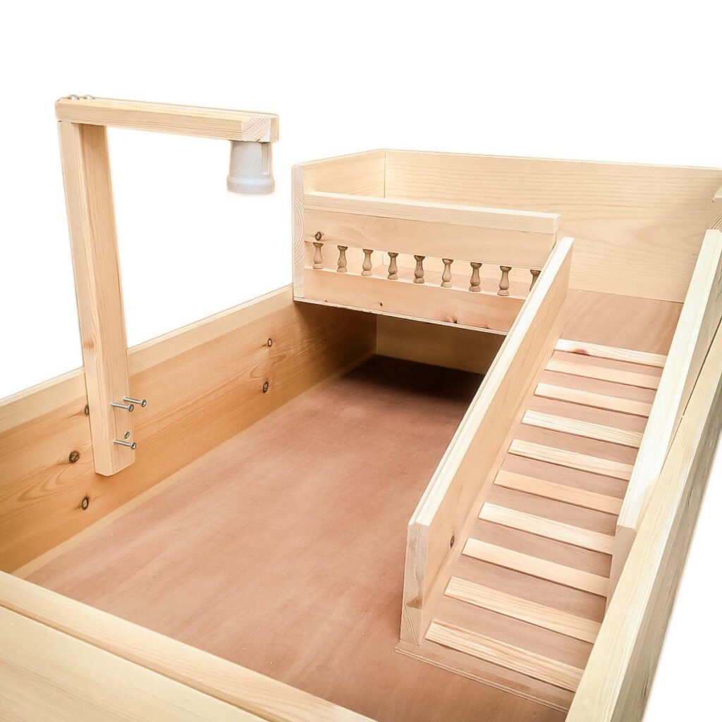 a wooden constructed tortoise table with stairs