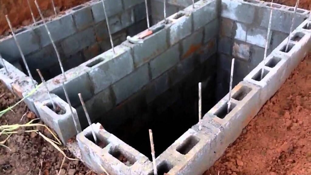 a concrete septic tank dug deep under the ground