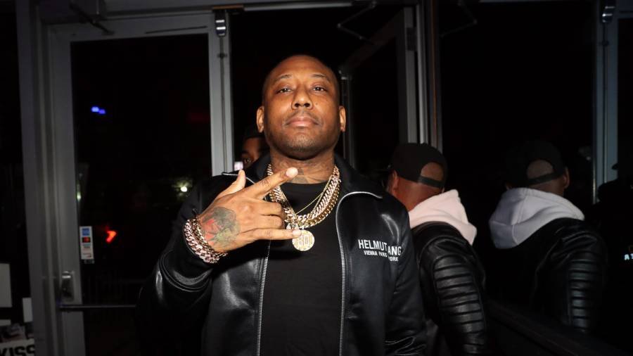 Alpo Martinez wearing a black jacket 