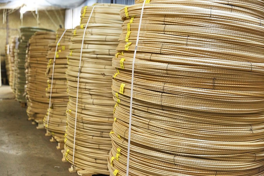 fiberglass regard stocked up in a warehouse under a wooden platform 