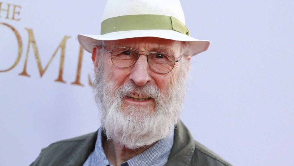 James Cromwell wearing a hat and glasses
