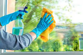 This picture shows the way mirror or glass can be cleaned.